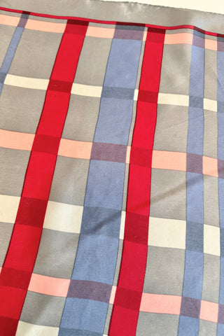 Lightweight, semi-sheer striped vintage scarf in shades of grey, blue, red, and pink. 