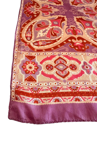 Swirling psychedelic print 1960s vintage scarf in shades of pink, purple, brown, and cream. Flowers, starbursts, paisley and other intricate shapes curve together in perfect harmony on this bright twill scarf.  