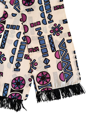 Long white vintage evening scarf with black fringed ends, featuring a collection of bold geometric shapes in shades of pigeon blue, plum purple and black. 