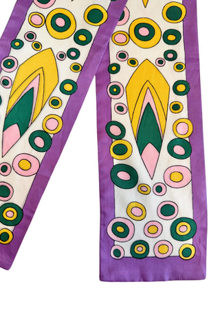 Bright, fun polka dot psychedelic print long scarf with a purple border and pattern in shades of bottle green, baby pink, and sunshine yellow.