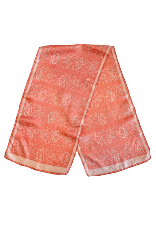 Long salmon pink vintage scarf with light pink border and floral print.