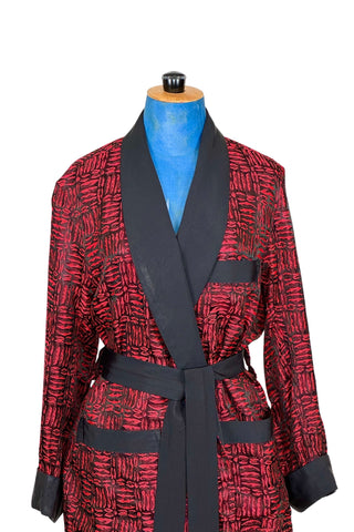 Suave vintage 1970s smoking jacket by Majestic in red and black patterned acetate (the collar, cuffs, and belt seem to be rayon faille, although the tag says 100% acetate - this may not include the trim). Slip into this beauty after a long day and let the mellowing out begin. 