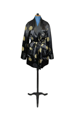 Rich, heavy rayon vintage 1940s robe of black and gold Chinese brocade. The brocade design features intricate gold and black medallions. The chest pocket is embroidered with a charming landscape scene. Fully lined in soft black rayon. Marked size 42. 