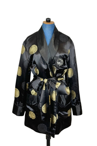 Rich, heavy rayon vintage 1940s robe of black and gold Chinese brocade. The brocade design features intricate gold and black medallions. The chest pocket is embroidered with a charming landscape scene. Fully lined in soft black rayon. Marked size 42. 