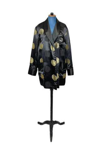 Rich, heavy rayon vintage 1940s robe of black and gold Chinese brocade. The brocade design features intricate gold and black medallions. The chest pocket is embroidered with a charming landscape scene. Fully lined in soft black rayon. Marked size 42. 