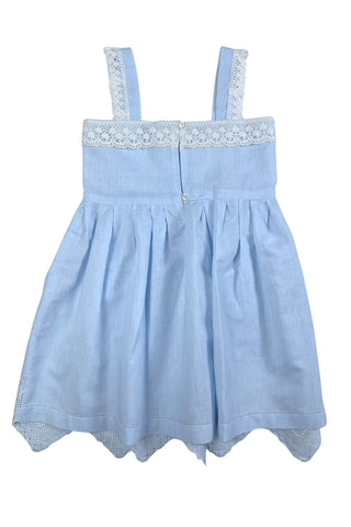 Intricately embroidered linen little girls’ dress with geometric floral openwork embroidery featured on the centre front of the pleated skirt. The front hem is heavily embroidered with a wide zig-zag panel of geometric and floral openwork embroidery.