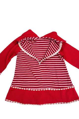 Vintage 1970s toddler dress in red, white, and black striped jersey, with a large pointed collar and oversized bow tie. The long sleeves, collar, and bottom panel of the skirt are solid red. The skirt is trimmed with daisy chain lace.

Crafted from a cotton/acrylic blend. The dress is unlined, and closes in the back with a cotton twill zipper.

Marked size 18 (months).