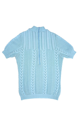 Vintage 1960s/1970s short sleeve sweater with an open eyelet knit pattern with vertical chevron panels and ribbed cuffs and collar. The back has a half-zipper closure. The material composition feels like a cotton/acrylic blend.