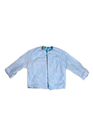 Vintage 1960s jacket in light blue cotton slub with a large tulip print. Features three-quarter length kimono-style sleeves, and an open front. Long darts from the bust to the waist provide shape through the torso. 

The lightweight jacket is lined in coordinating light blue rayon, which peeks through at the collar.