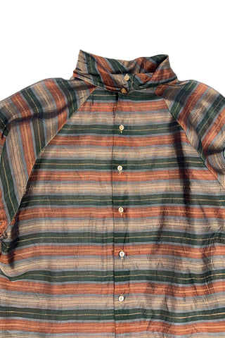 Vintage 70s/80s blouse in a sheer green, brown, and gold metallic striped rayon material. Features a folded scarf-like collar, long sleeves with buttoned cuffs, and closes with buttons down the back. 

Designed by Benjamin and Made in Italy. Marked size 46.