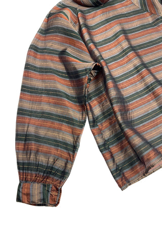 Vintage 70s/80s blouse in a sheer green, brown, and gold metallic striped rayon material. Features a folded scarf-like collar, long sleeves with buttoned cuffs, and closes with buttons down the back. 

Designed by Benjamin and Made in Italy. Marked size 46.
