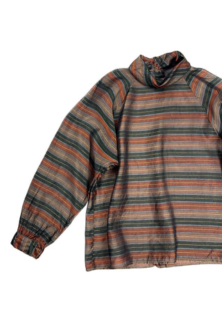 Vintage 70s/80s blouse in a sheer green, brown, and gold metallic striped rayon material. Features a folded scarf-like collar, long sleeves with buttoned cuffs, and closes with buttons down the back. 

Designed by Benjamin and Made in Italy. Marked size 46.