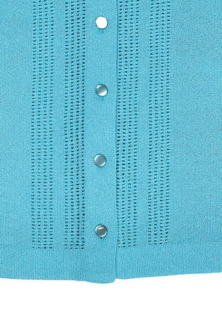 Vintage 1960s cardigan sweater in peacock blue Dacron polyester knit. The collar and button placket are accented with eyelet detailing. The cardigan closes with six pearly lucite buttons. 

The material is a medium weight polyester knit with a structured feel.

Designed by Kimberly.
