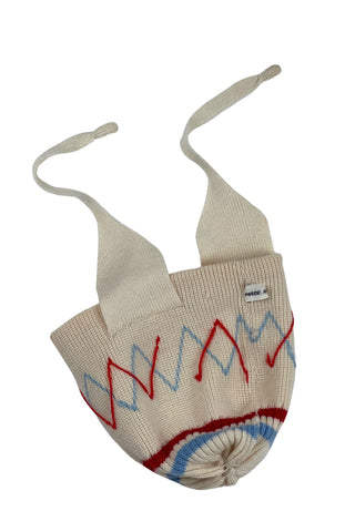 Vintage 1960s wool baby hat with ear flaps and chin tie. Features a folded, striped brim around the head, and a pompom on top.

The only label reads Made in Canada.