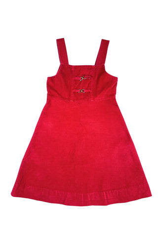 Vintage 1970s girls’ jumper dress in red cotton corduroy with decorative gold buckles across the bodice. Features a classic A-line silhouette with wide shoulder straps.

Designed by Encore. Made in Canada.

85% cotton, 15% polyester.