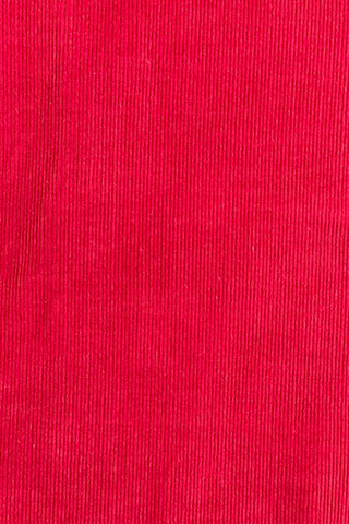 Vintage 1970s girls’ jumper dress in red cotton corduroy with decorative gold buckles across the bodice. Features a classic A-line silhouette with wide shoulder straps.

Designed by Encore. Made in Canada.

85% cotton, 15% polyester.