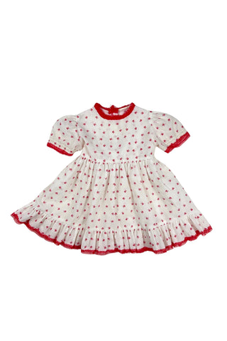 Vintage 1970s baby dress set with insect print. The set includes a dress, matching bloomers, and a red velvet vest with a peplum ruffle. The dress has short, puffed sleeves, a round neckline, and a gathered, full skirt with a back sash bow tie. The collar, cuffs, and hem are trimmed with delicate red lace. 

The dress and vest both close in the back with three pearly buttons.