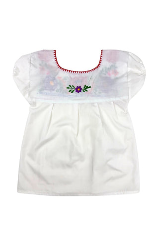 Vintage girls’ embroidered Mexican blouse with bright red, purple, pink, and orange flowers and green vines , featuring puffed sleeves with elasticized cuffs. The back of the shirt has a tiny purple flower.

The neckline and yoke are finished with a red blanket stitch.

The material feels like a cotton/poly blend.