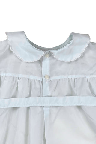 Vintage 1960s baby ‘bubble’ onesie in light blue acetate with a sweet bird appliqué design across the chest. Features a scalloped Peter Pan collar, short, puffed sleeves, and a buttoned belt at the waist.

The leg openings are elasticized. The onesie closes at the bottom with two buttons.