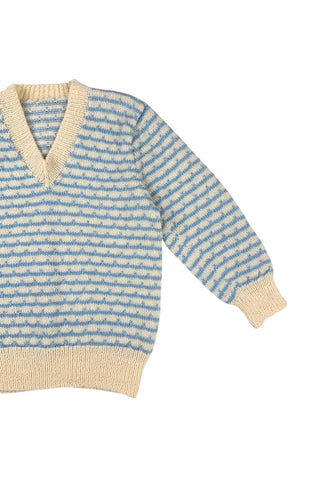 Vintage 1970s children’s wool sweater in white and blue ‘wave’ stripe. V-neck, with wide white collar, cuffs, and hem. Hand knit.