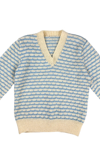Vintage 1970s children’s wool sweater in white and blue ‘wave’ stripe. V-neck, with wide white collar, cuffs, and hem. Hand knit.