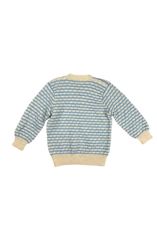 Vintage 1970s children’s wool sweater in white and blue ‘wave’ stripe. V-neck, with wide white collar, cuffs, and hem. Hand knit.