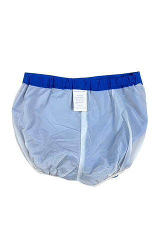Vintage 1960s baby shorts with inner plastic diaper cover lining (which can easily be cut out, if you prefer). The shorts are made of a poly/cotton blend in bright royal blue, and features a faux fly placket on the front, and pin tucks down the legs. The waist is elasticized.

Marked size 12 months. Made in the Philippines.
