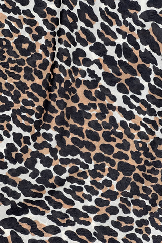 Vintage 1960s half slip in a bold leopard print nylon.

The slip features an A-line silhouette and elasticized waist. The hem is rolled with a hidden stitch.

Wear as a slip peeking out from under your favourite skirt, or wear as a skirt of its own!