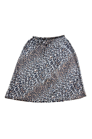 Vintage 1960s half slip in a bold leopard print nylon.

The slip features an A-line silhouette and elasticized waist. The hem is rolled with a hidden stitch.

Wear as a slip peeking out from under your favourite skirt, or wear as a skirt of its own!