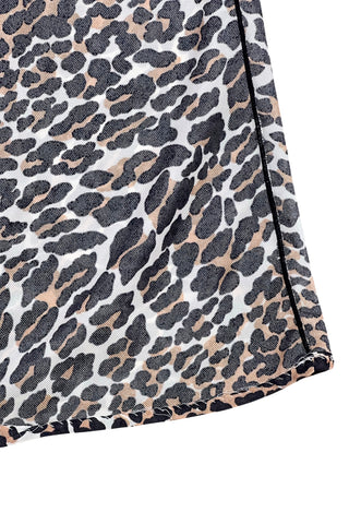 Vintage 1960s half slip in a bold leopard print nylon.

The slip features an A-line silhouette and elasticized waist. The hem is rolled with a hidden stitch.

Wear as a slip peeking out from under your favourite skirt, or wear as a skirt of its own!