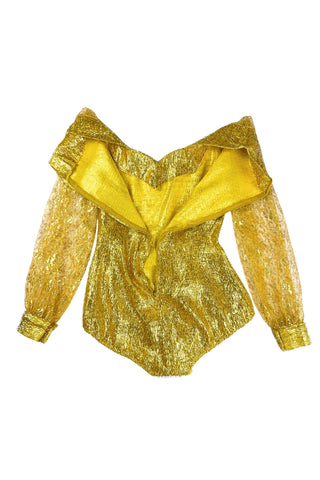 Vintage 1960s gold fringe bodysuit costume with long cuffed sheer lace sleeves and a sweetheart neckline. The hourglass cut of the non-stretch gold material keeps all your curves in place in a classic bombshell shape.

The costume closes in the back with a long cotton twill zipper. There is no opening at the bottom. The long sleeves close with hook and eye closures instead of buttons.