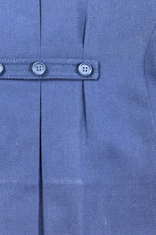Vintage 1960s Jean Bailly toddler coat in navy blue. Features a double-breasted button placket, faux pocket flaps with real slash pockets beside them, and a half-sash in the back with three buttons.

Fully lined in navy blue acetate.