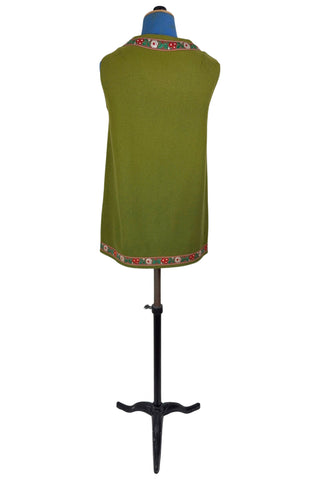 Vintage Trachten-style green wool folk vest featuring floral embroidery trim and a closing tab which fastens with a snap.