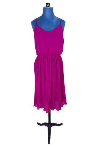 Vintage 1970s cocktail dress in raspberry chiffon with an accordion pleated skirt with elasticized waist.

Designed by Lori Ann Petites. Made in Canada.

Marked size 7/8. Fits like a medium to large.