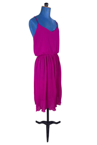 Vintage 1970s cocktail dress in raspberry chiffon with an accordion pleated skirt with elasticized waist.

Designed by Lori Ann Petites. Made in Canada.

Marked size 7/8. Fits like a medium to large.