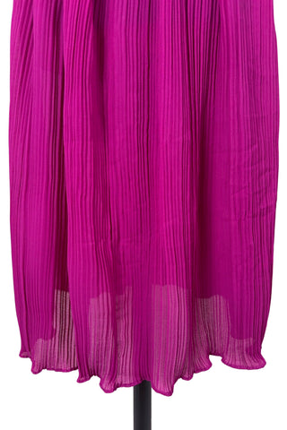 Vintage 1970s cocktail dress in raspberry chiffon with an accordion pleated skirt with elasticized waist.

Designed by Lori Ann Petites. Made in Canada.

Marked size 7/8. Fits like a medium to large.
