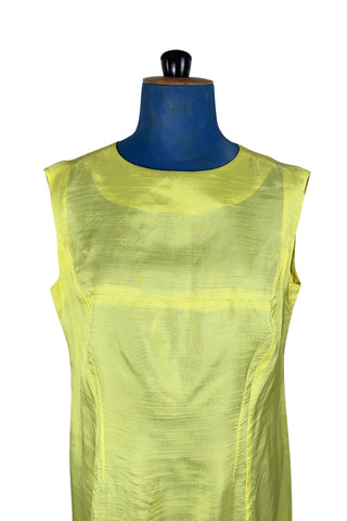 Vintage 1960s shift dress in sunny yellow rayon that resembles shot silk.  Sleeveless, with a round neckline. The dress closes in the back with a cotton twill zipper, and is unlined.