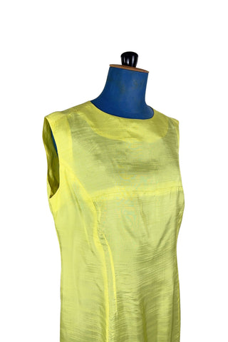 Vintage 1960s shift dress in sunny yellow rayon that resembles shot silk.  Sleeveless, with a round neckline. The dress closes in the back with a cotton twill zipper, and is unlined.