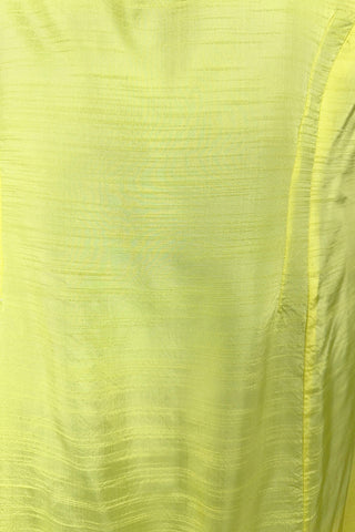 Vintage 1960s shift dress in sunny yellow rayon that resembles shot silk.  Sleeveless, with a round neckline. The dress closes in the back with a cotton twill zipper, and is unlined.