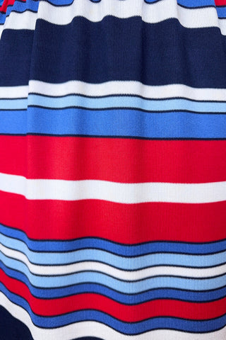 Vintage 1960s day dress with turtleneck rolled collar, long sleeves, and contrasting striped skirt in red, white and blue. Closes in the back with a cotton twill zipper. 

Designed by JC Penney Fashions.
